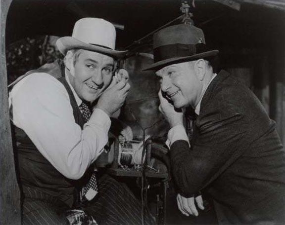 Oliver and Mr. Haney Happily Listening to the Radio