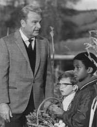 Oliver with some children in his infamous corn field.