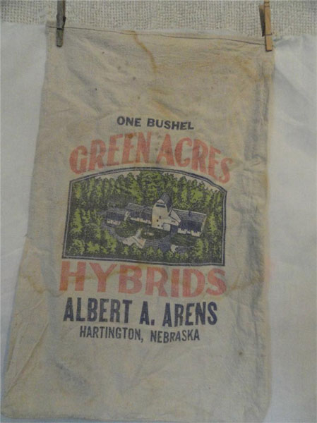 One bushel of Green Acres Hybrid Seeds.